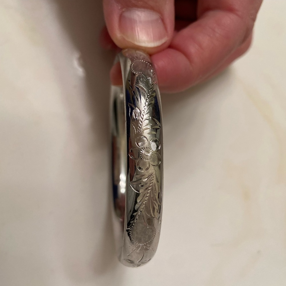 Silver bangle bracelet with filigree etching